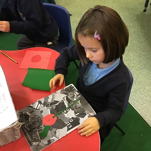 Child doing Remembrance crafts